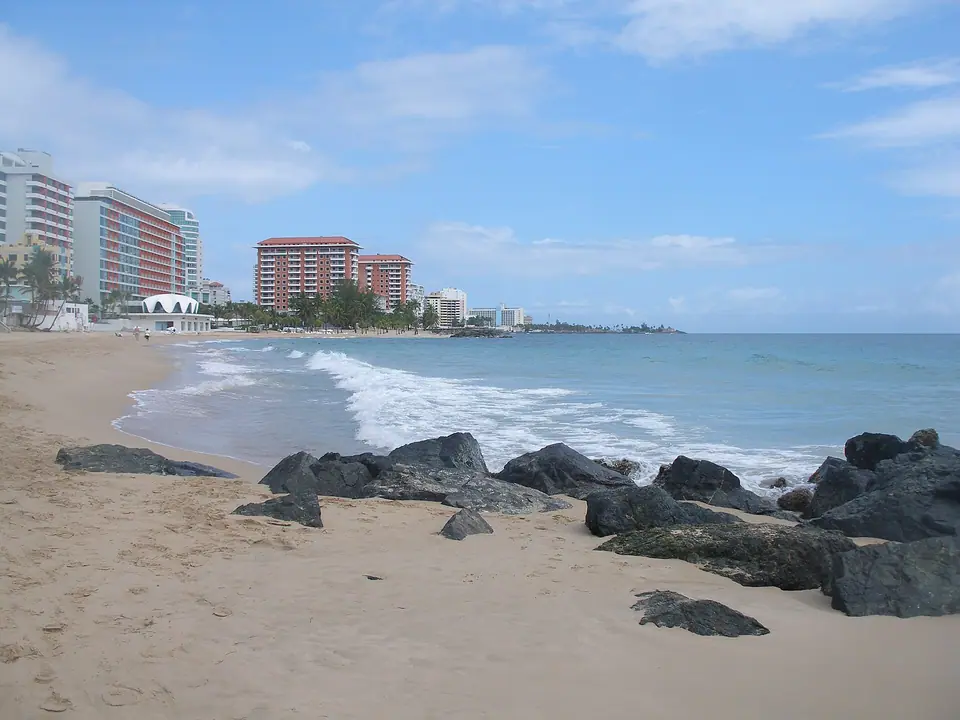 Ocean-side beach in the Condado district of San Juan lined with hotels