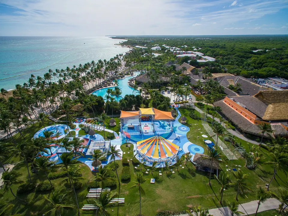 Aerial view of Club Med Punta Cana with pools, low-rise buildings and the beach