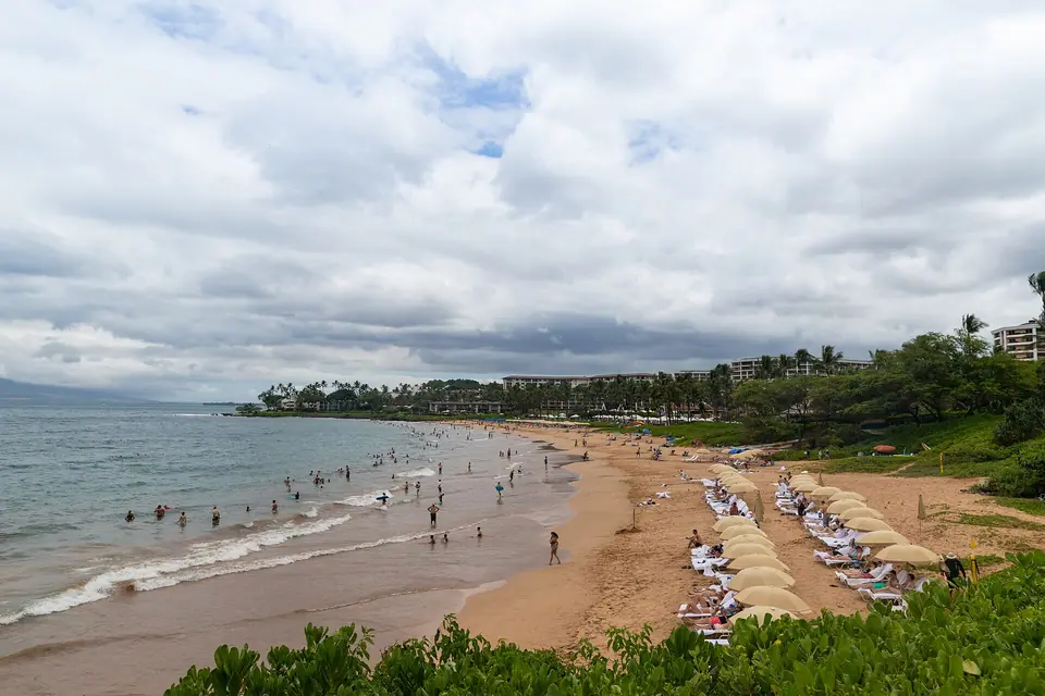 The Wailea shoreline on Maui with sand, lawns and resorts