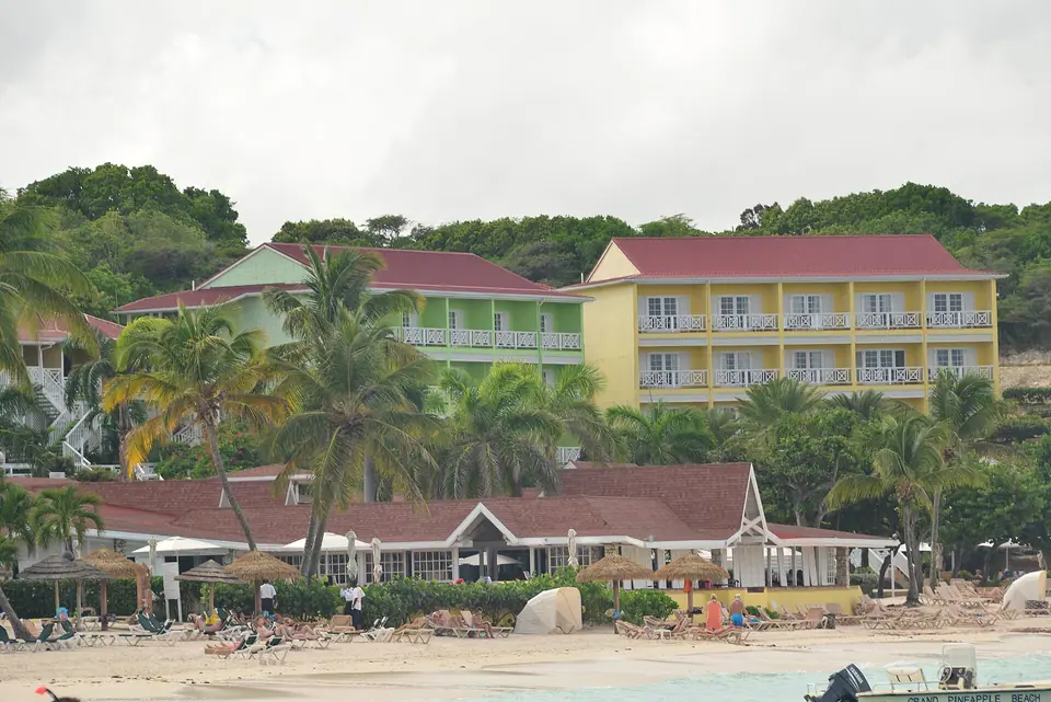Reef-sheltered water and sandy shoreline at Long Bay on Antigua's east coast