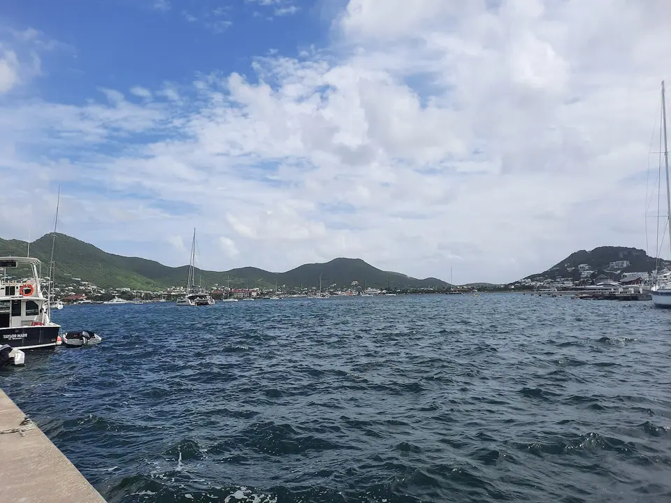Boats moored on Simpson Bay Lagoon with hills behind, Sint Maarten