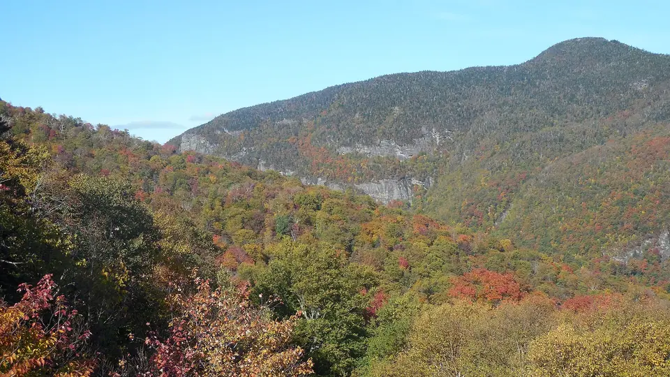 Fall colors on the mountains either side of Smugglers Notch, Vermont