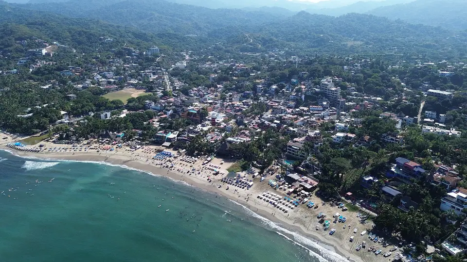 Aerial view of the surf beach and colorful town of Sayulita in Riviera Nayarit
