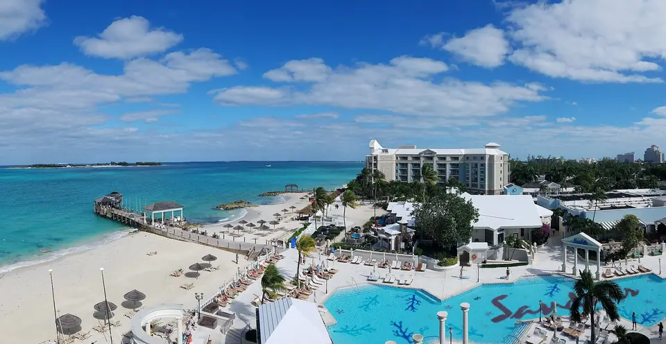Panoramic view of Sandals Royal Bahamian's buildings, pool and beachfront in Nassau