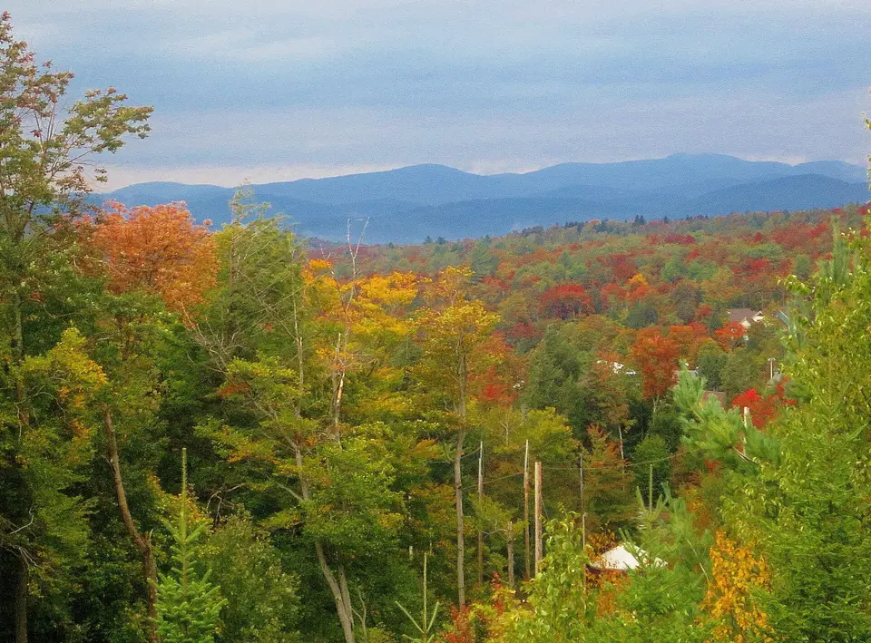 Rocky, wooded slopes of Smugglers Notch pass in Vermont's Green Mountains