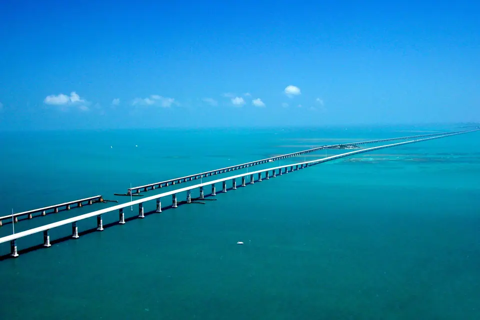 Aerial view of the Seven Mile Bridge and the old bridge crossing turquoise water in the Florida Keys
