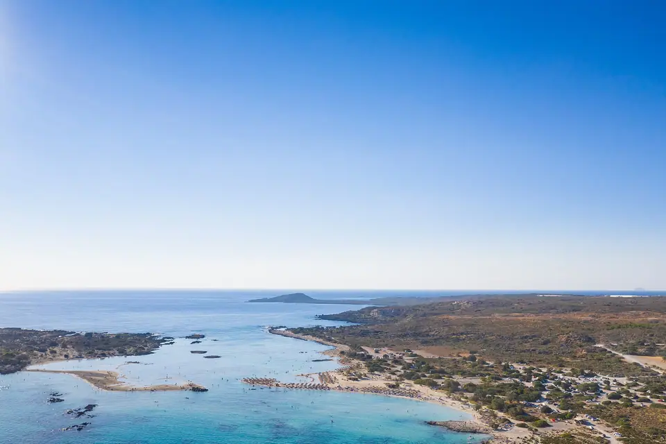 Aerial view of the shallow pink-and-turquoise Elafonisi lagoon on Crete's southwest coast
