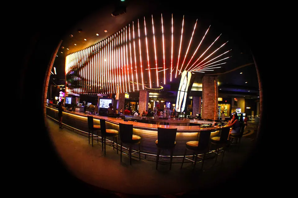 Illuminated bar counter inside the Oro nightclub at Hard Rock Hotel & Casino Punta Cana