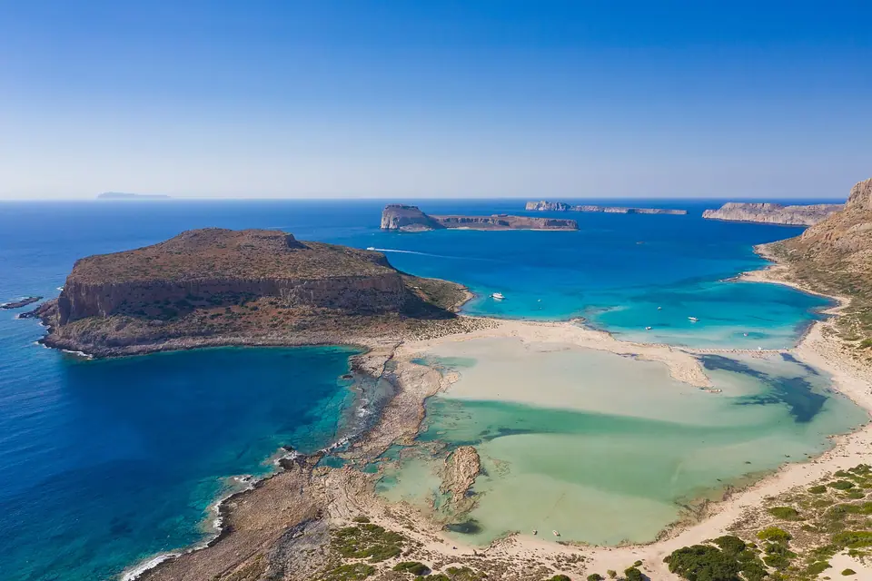 Aerial view of Balos Lagoon in western Crete, with turquoise shallows and a pale sand spit