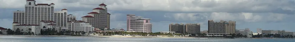 Wide panorama of the Cable Beach skyline in Nassau with hotel towers along the shore