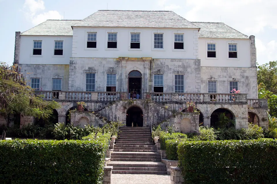 The white Georgian facade of Rose Hall Great House on a hill near Montego Bay