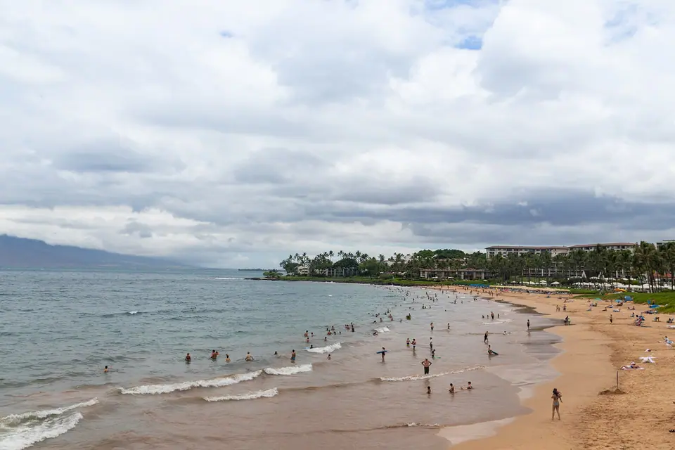 Sandy beach and calm water along the Wailea coastline on Maui