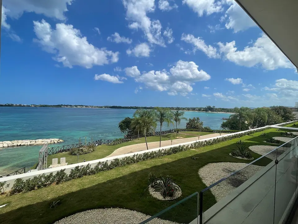 Calm water and beach of Bloody Bay photographed from the grounds of Royalton Negril