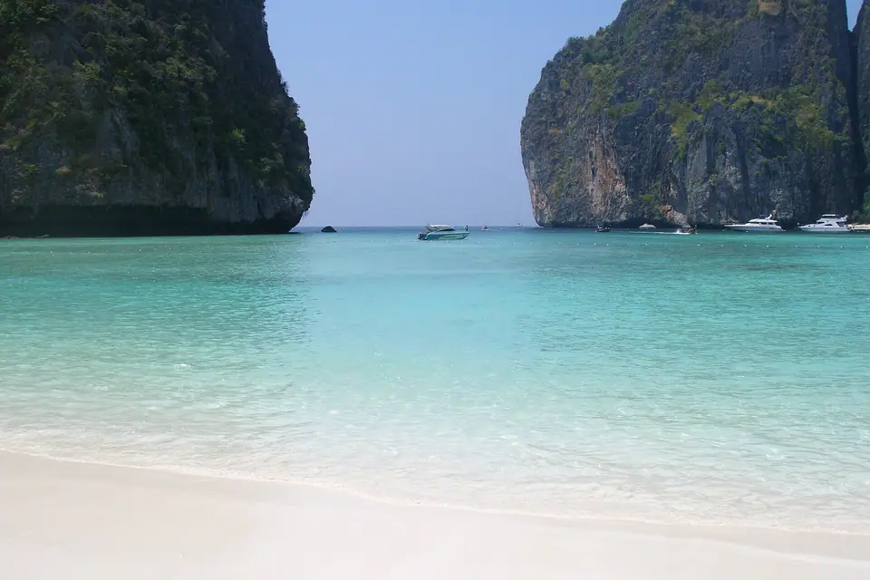Maya Bay on Koh Phi Phi Leh enclosed by steep limestone cliffs