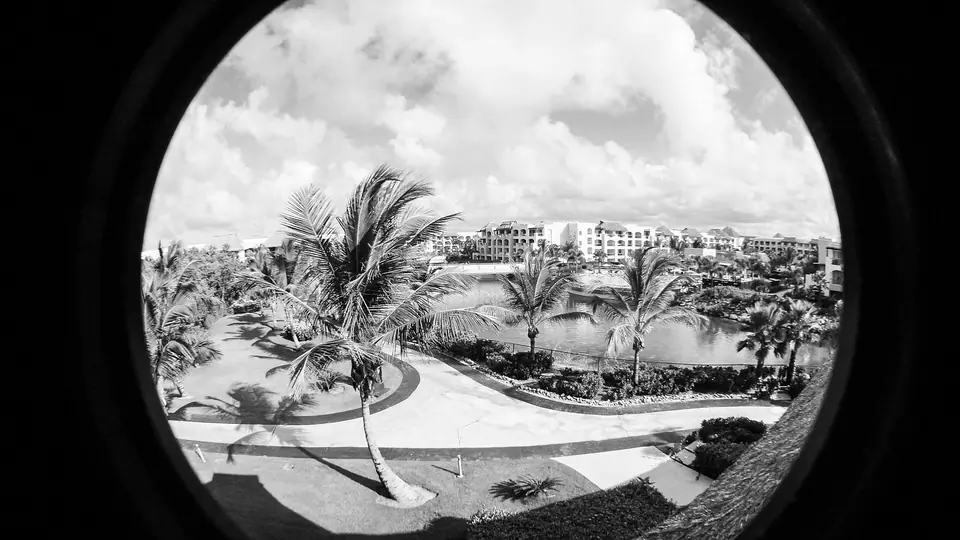 Landscaped gardens, palms and low-rise buildings at Hard Rock Hotel Punta Cana