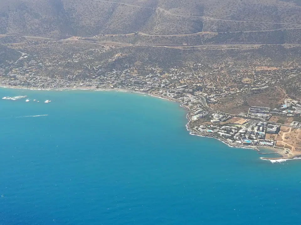 Aerial view of the coastline and beach hotels at Stalida on Crete