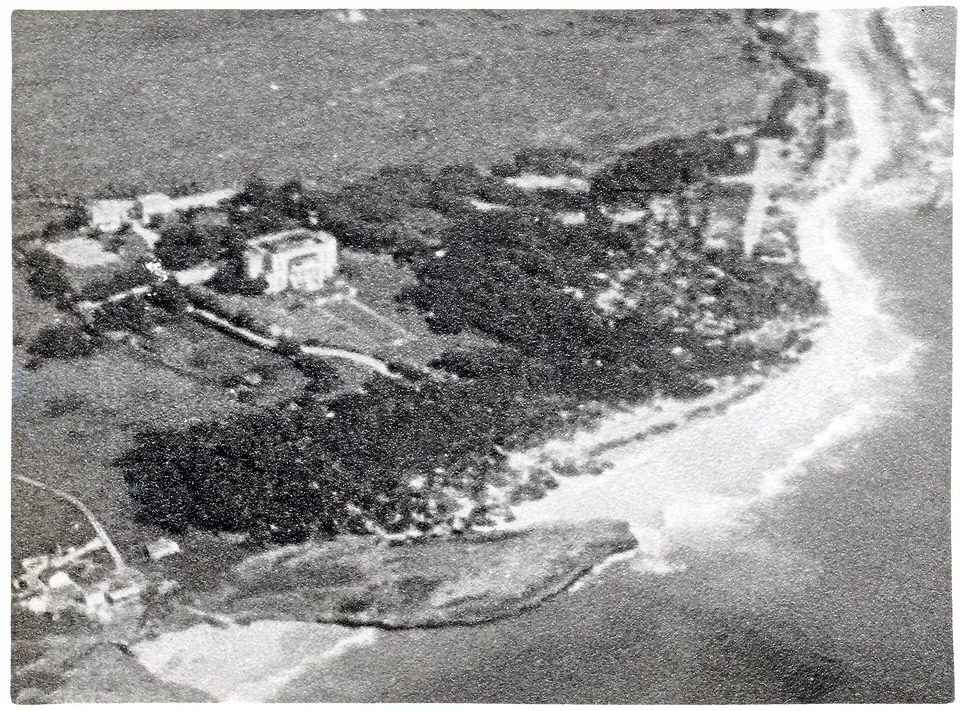 Black-and-white 1949 aerial photograph of Sam Lord's Castle estate and its beach on the southeast coast