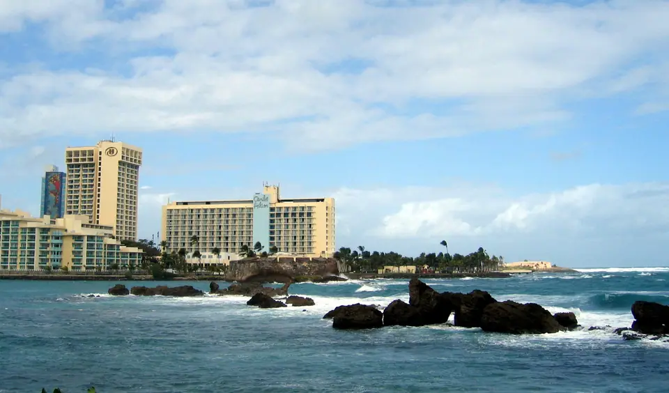 Caribe Hilton hotel and Fort San Gerónimo seen across the water from Condado in San Juan
