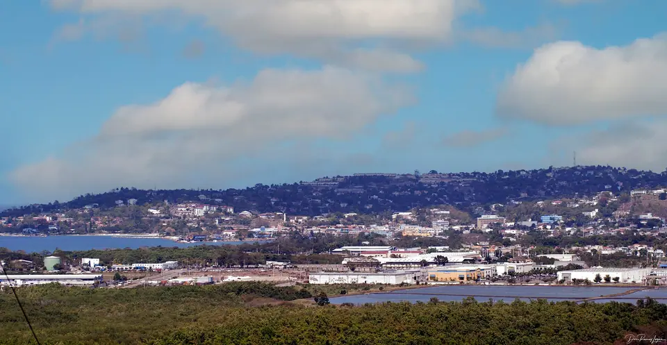 Panorama of Montego Bay city spreading up the hills above the harbor and Freeport area