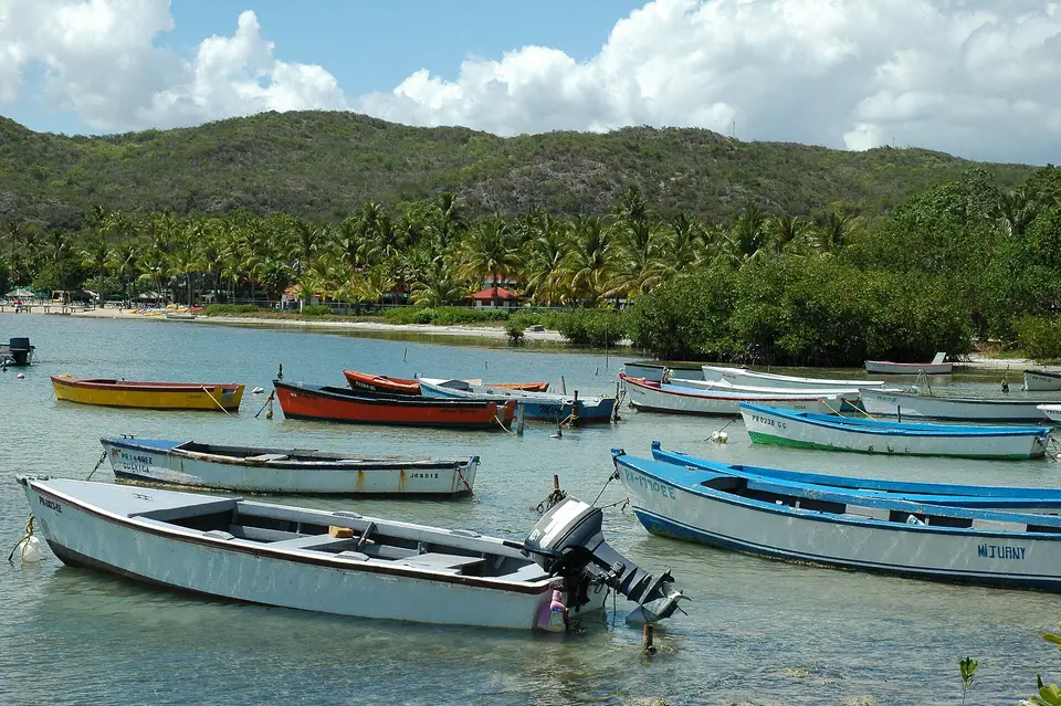 Boats moored off San Jacinto near Guánica with Copamarina Beach Resort on the far shore